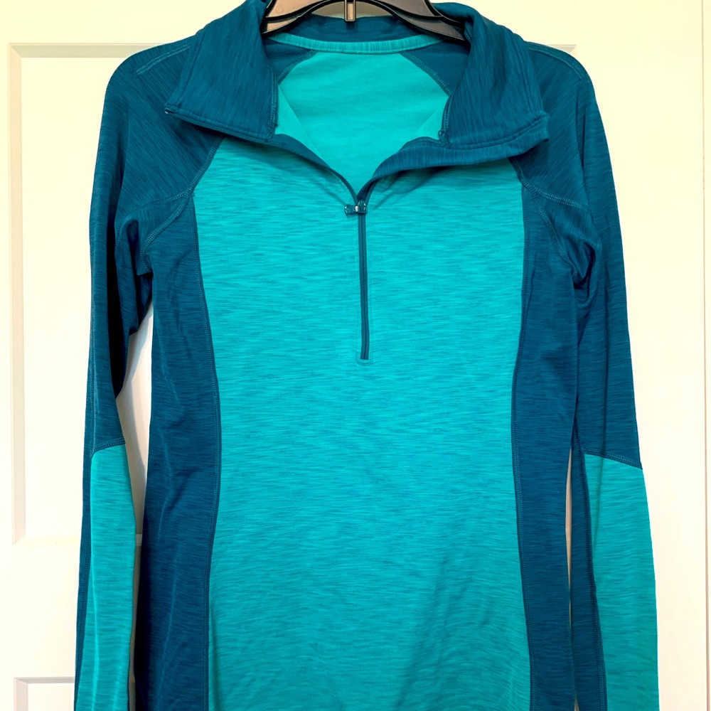 Under Armour size medium long sleeve 1/4 zip.
